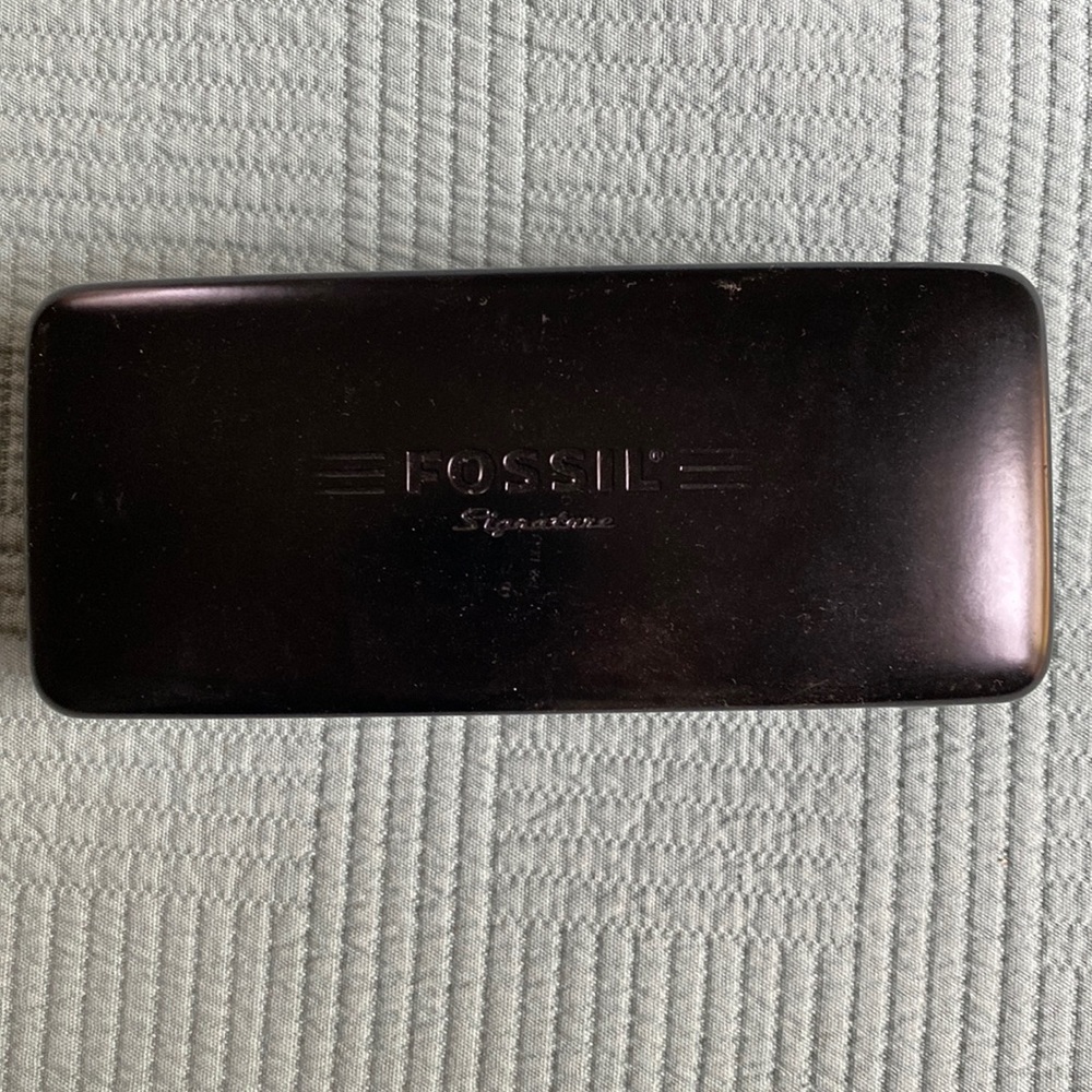 Vintage Fossil black hinged sunglasses case 2 inches tall excellent condition.